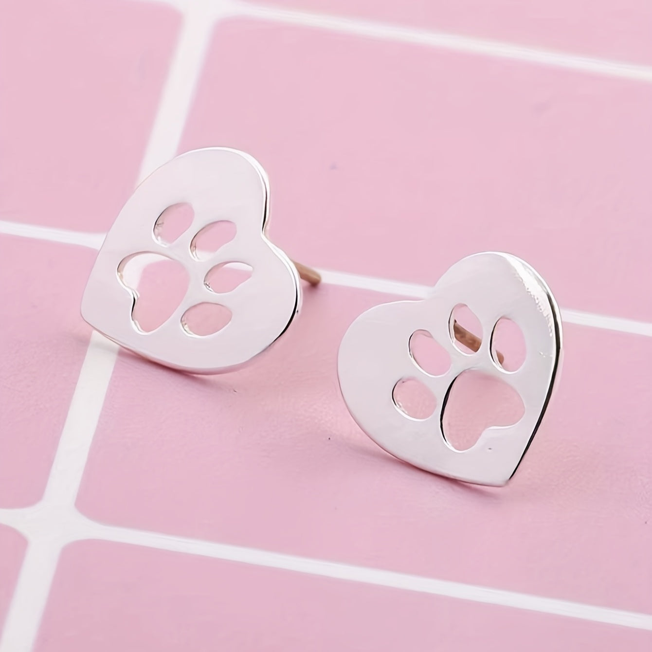 Heart-Shaped Hollow Animal Footprint Stud Earrings – Cute & Elegant Stainless Steel Jewelry