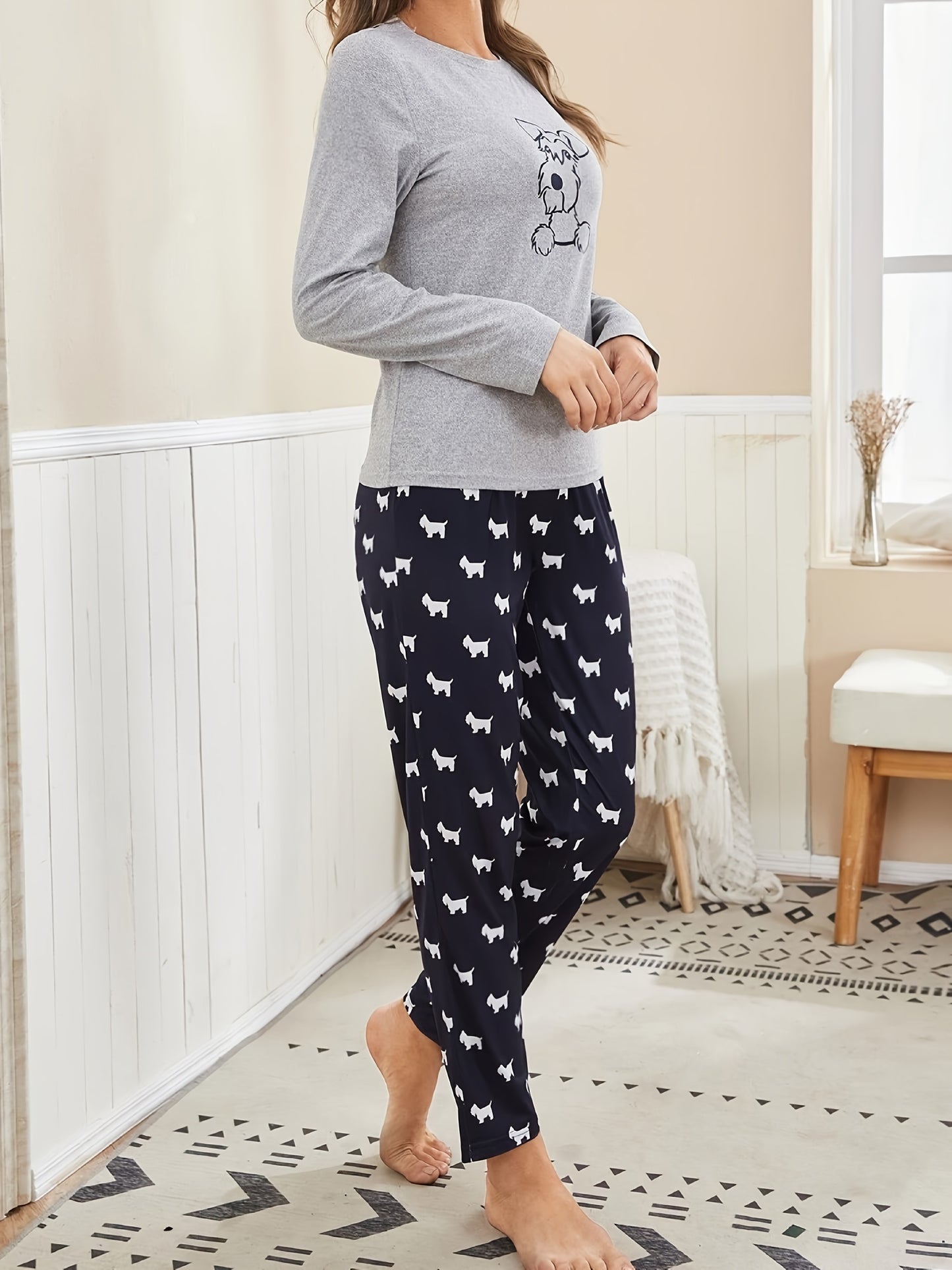 Cartoon Dog Print Pajama Set |  Featuring a cute and playful dog print, this set includes a long-sleeve crew neck top and matching elastic waistband pants, making it the ultimate loungewear for dog lovers.