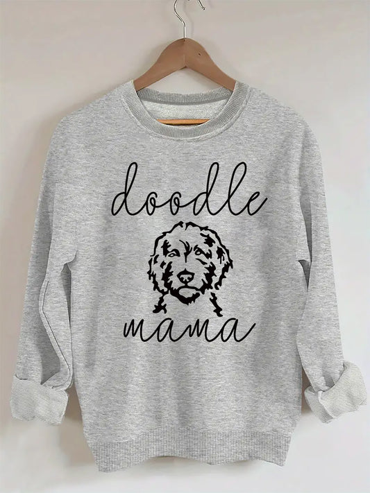 "Doodle Mama" Dog & Letter Print Sweatshirt. Designed for style and comfort, perfect for dog lovers- stay warm while looking effortlessly chic