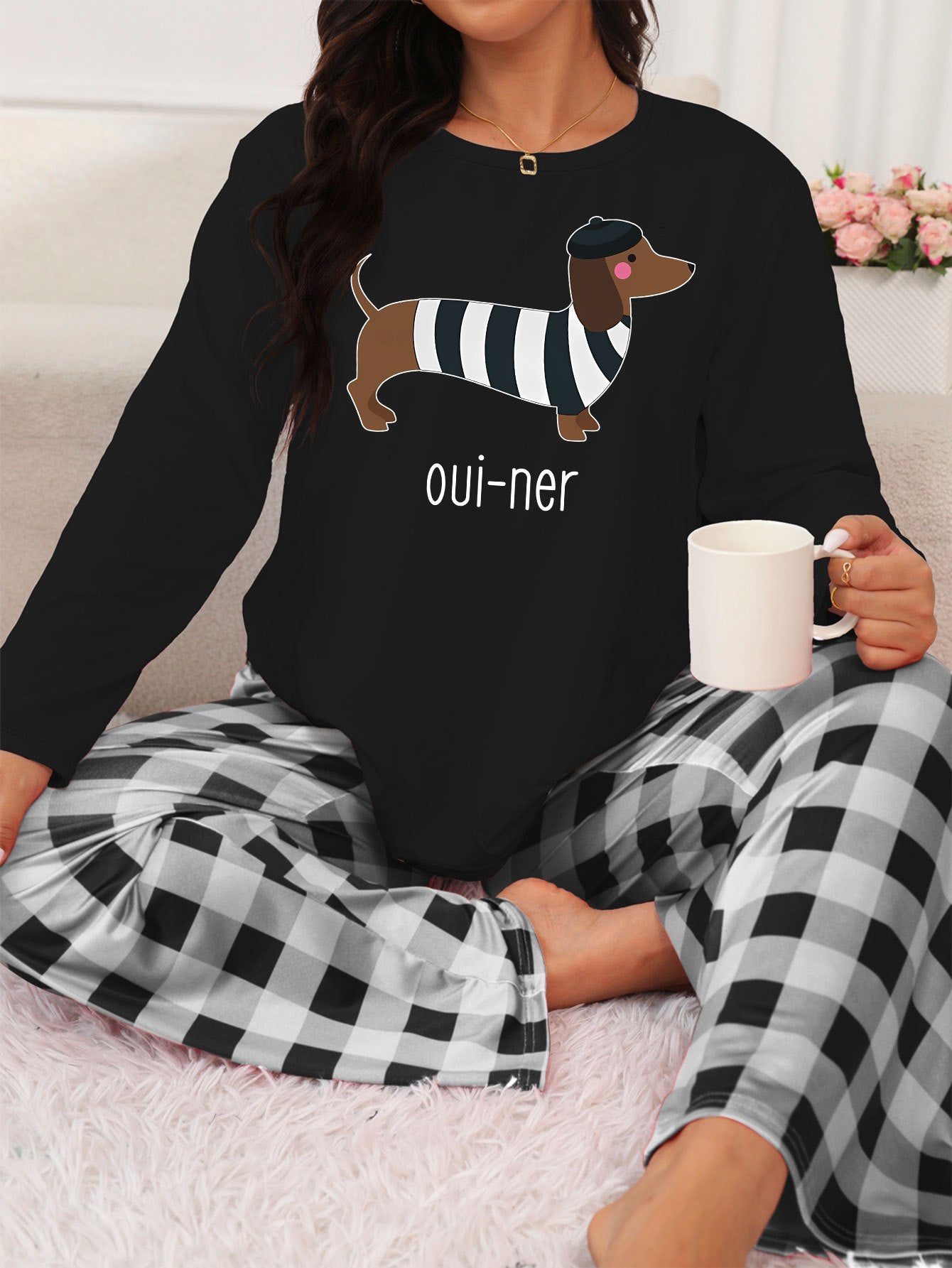 Festive Dachshund Pajama Set -Featuring a long sleeve top adorned with an adorable striped dachshund design, this pajama set is both playful and comfortable.